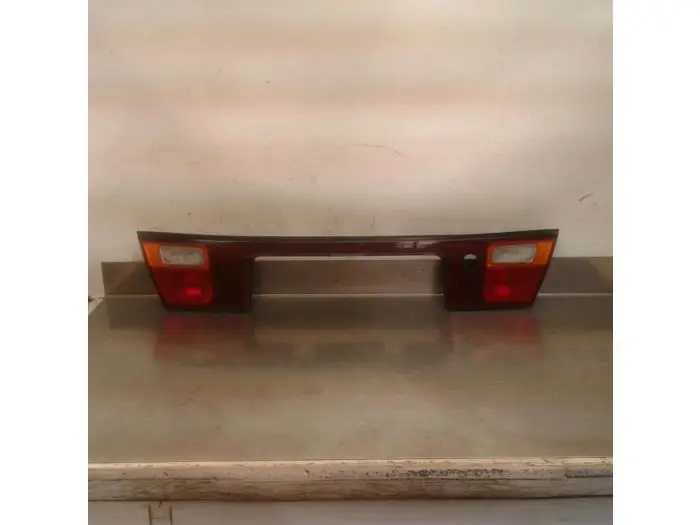 Réflecteur plaque arrière Mazda 323