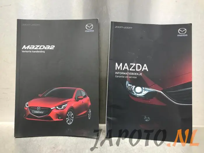 Livret d'instructions Mazda 2.