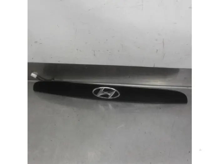 Poignée couvercle coffre Hyundai Accent